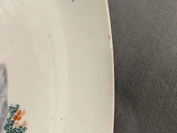 A Chinese famille rose dish with a lady in a landscape, Yongzheng